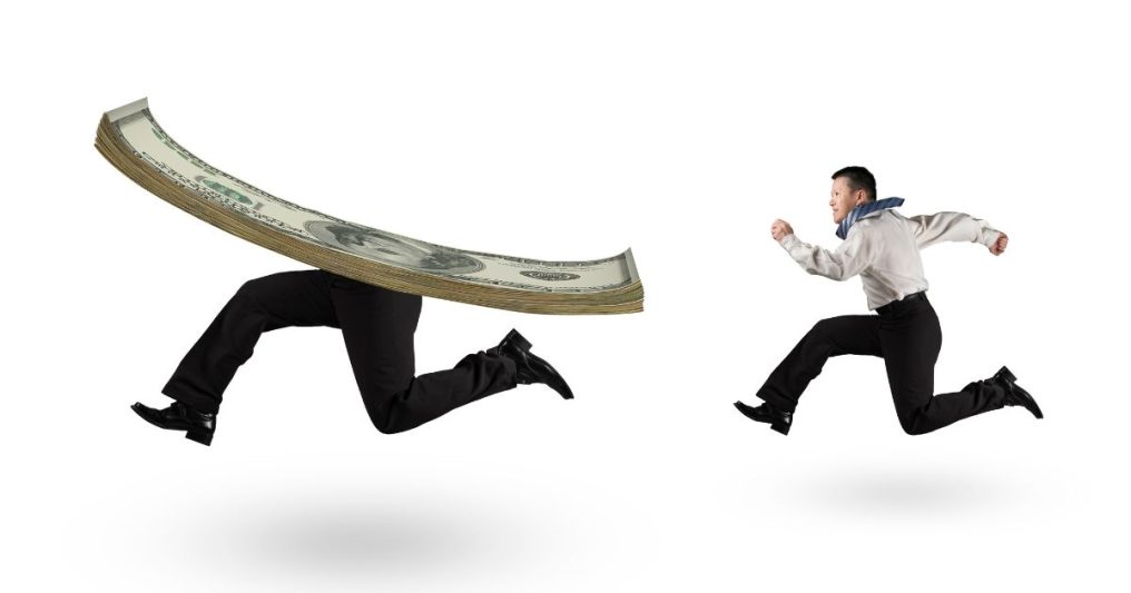A man running after money with human legs isolated on a white background.